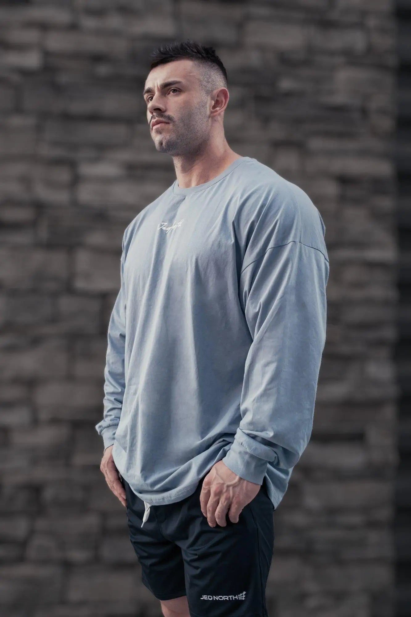 A light blue jed north energy oversized long sleeve t-shirt 2.0 with crewneck and small white chest logo
