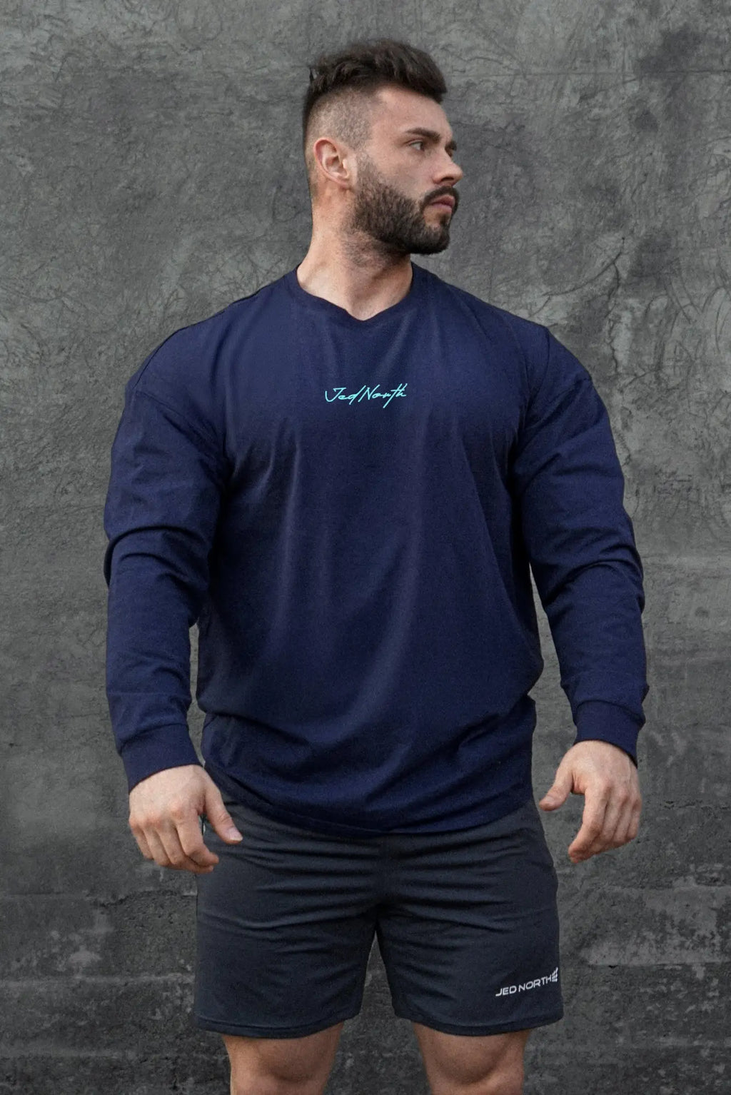 Navy blue Jed North Energy Oversized Long Sleeve T-Shirt 2.0 with subtle white cursive logo on the chest