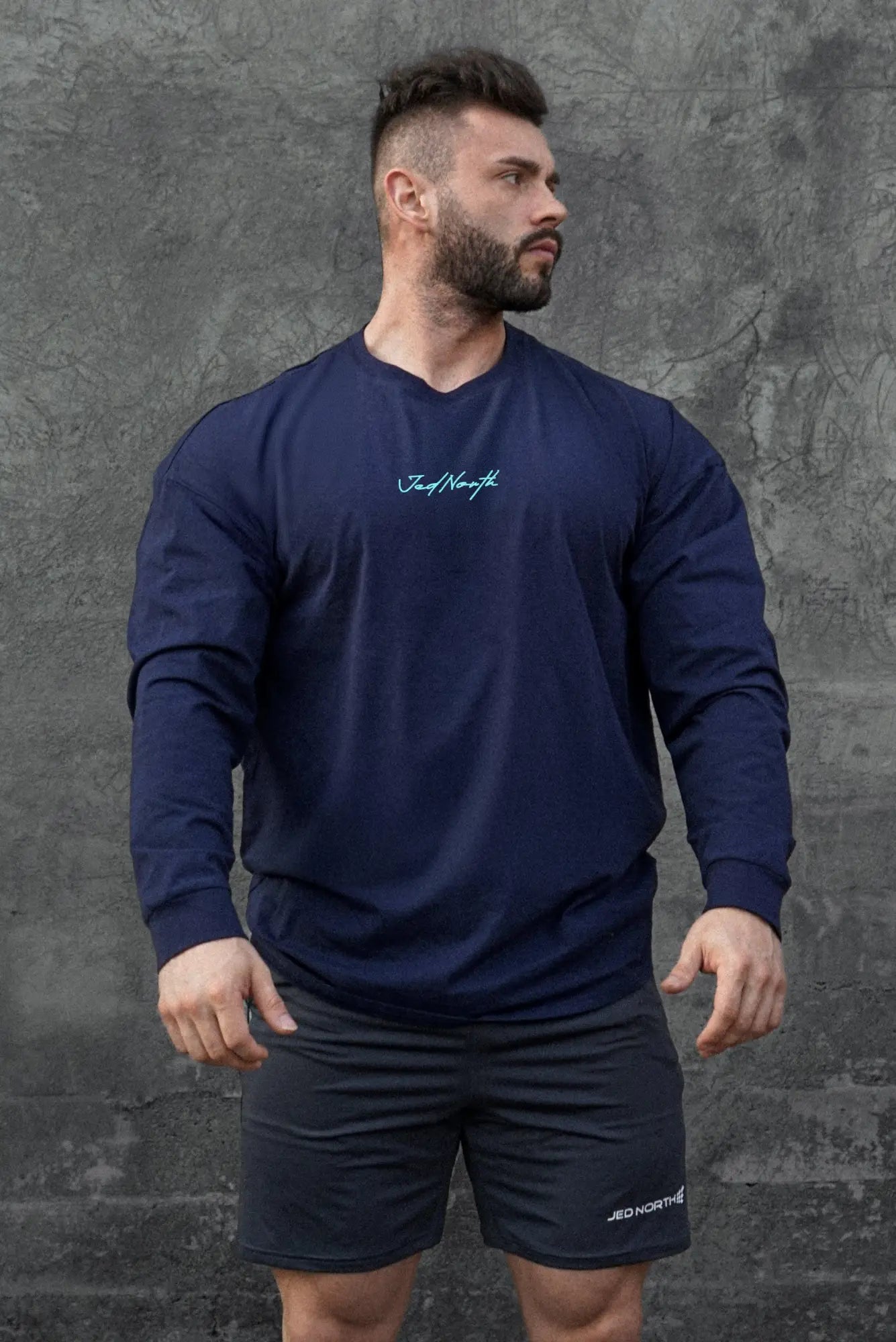 Navy blue Jed North Energy Oversized Long Sleeve T-Shirt 2.0 with subtle white cursive logo on the chest