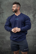Navy blue jed north energy oversized long sleeve v neck athletic shirt with light teal cursive logo on chest