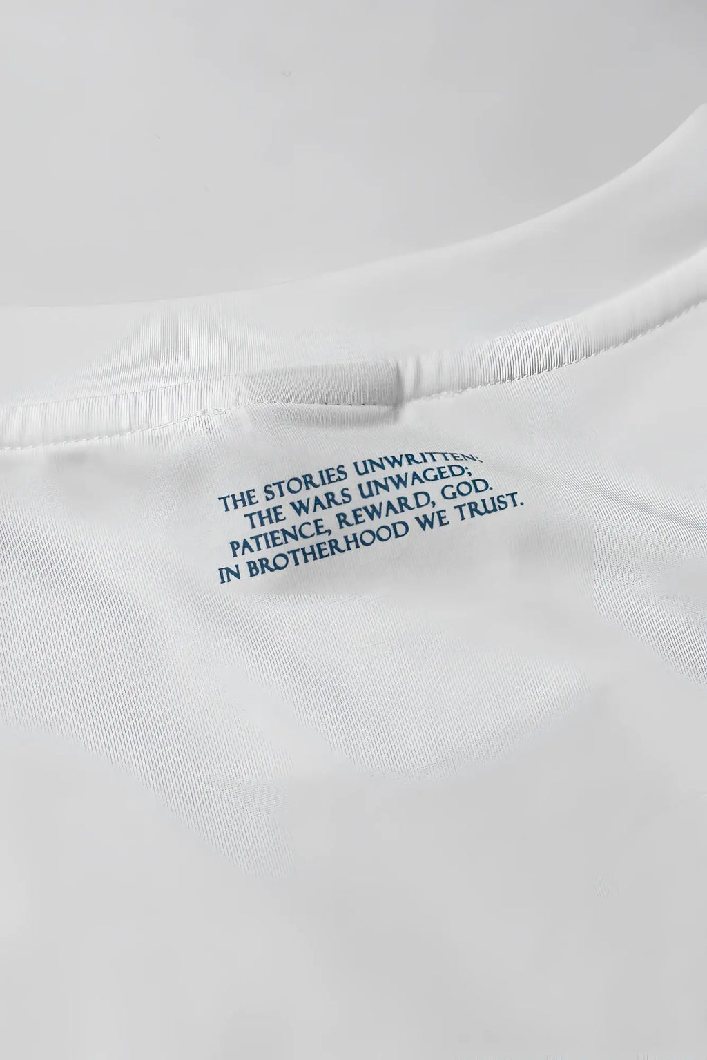 Energy oversized t-shirt cream white cotton with navy blue embroidered text at the neckline