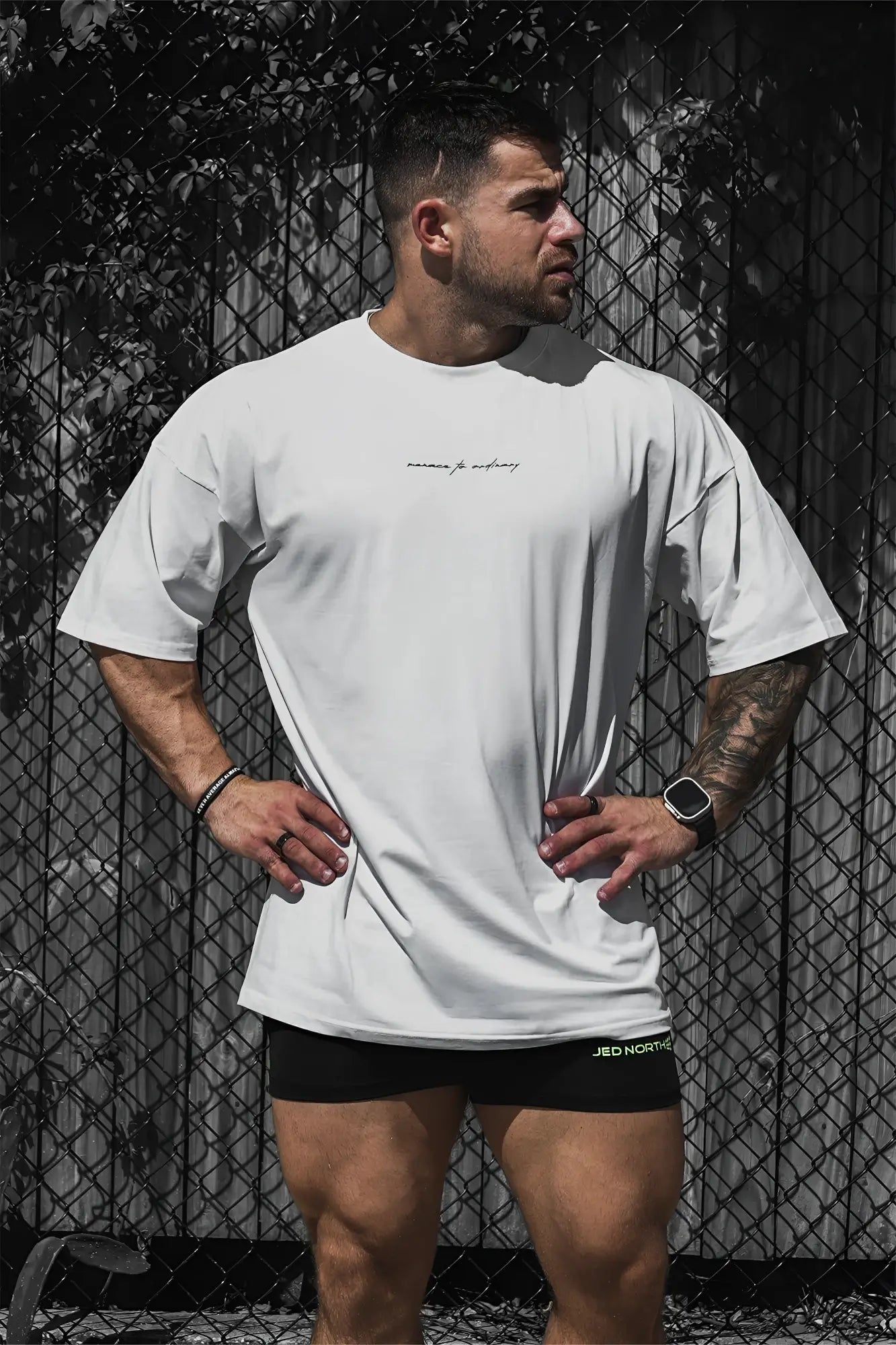 Energy oversized t shirt cream featuring a white oversized fit with a subtle cursive chest logo in soft cotton material