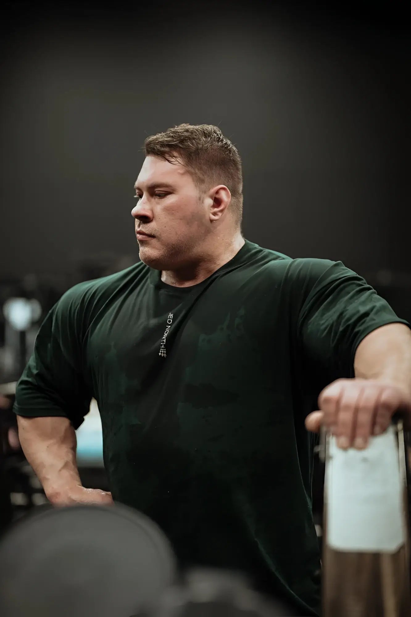 Jed North energy oversized t-shirt in forest green with short sleeves and a subtle vertical logo on the left chest