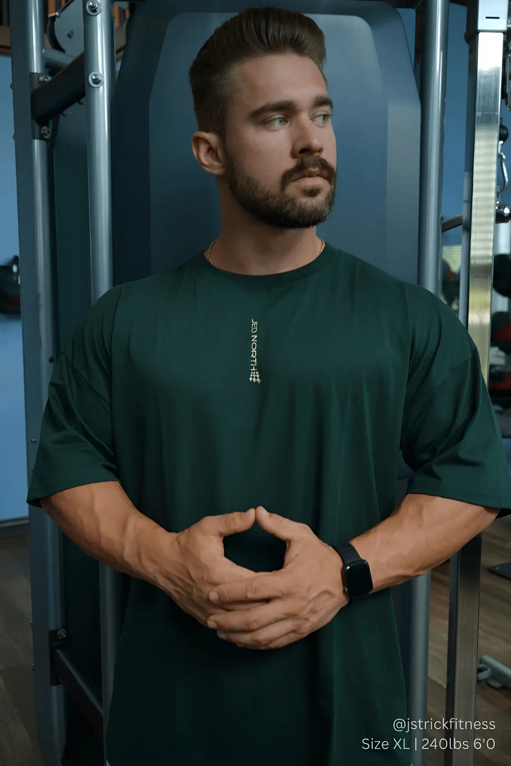Jed North Energy oversized t-shirt in forest green with vertical white lettering on the left chest, short sleeves