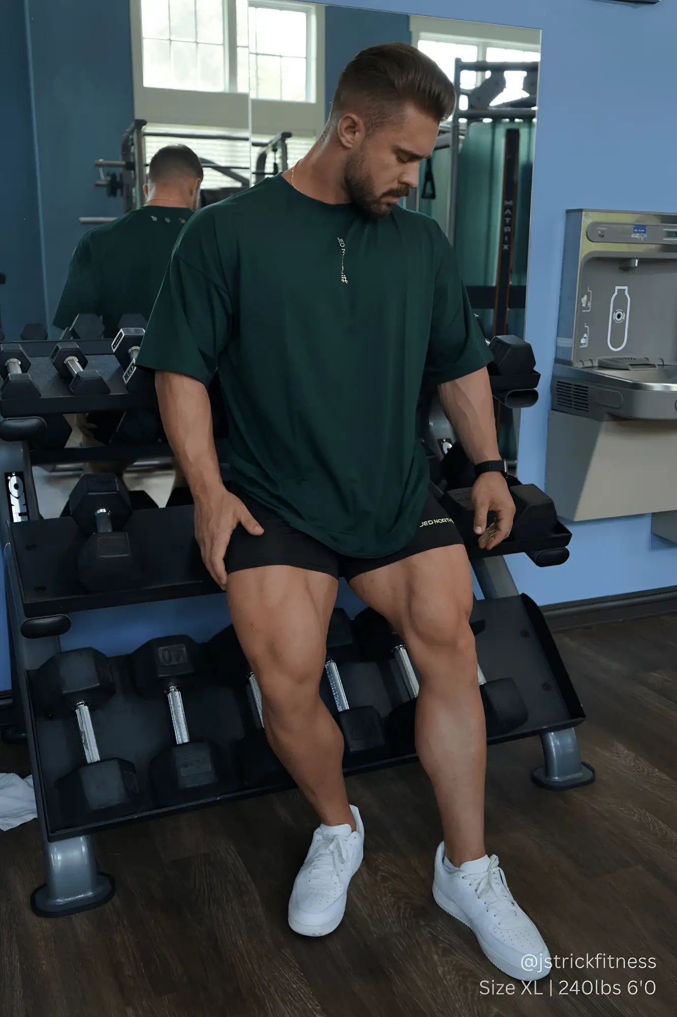 Dark green jed north energy oversized t-shirt with short sleeves and a zipper at the neckline in forest green