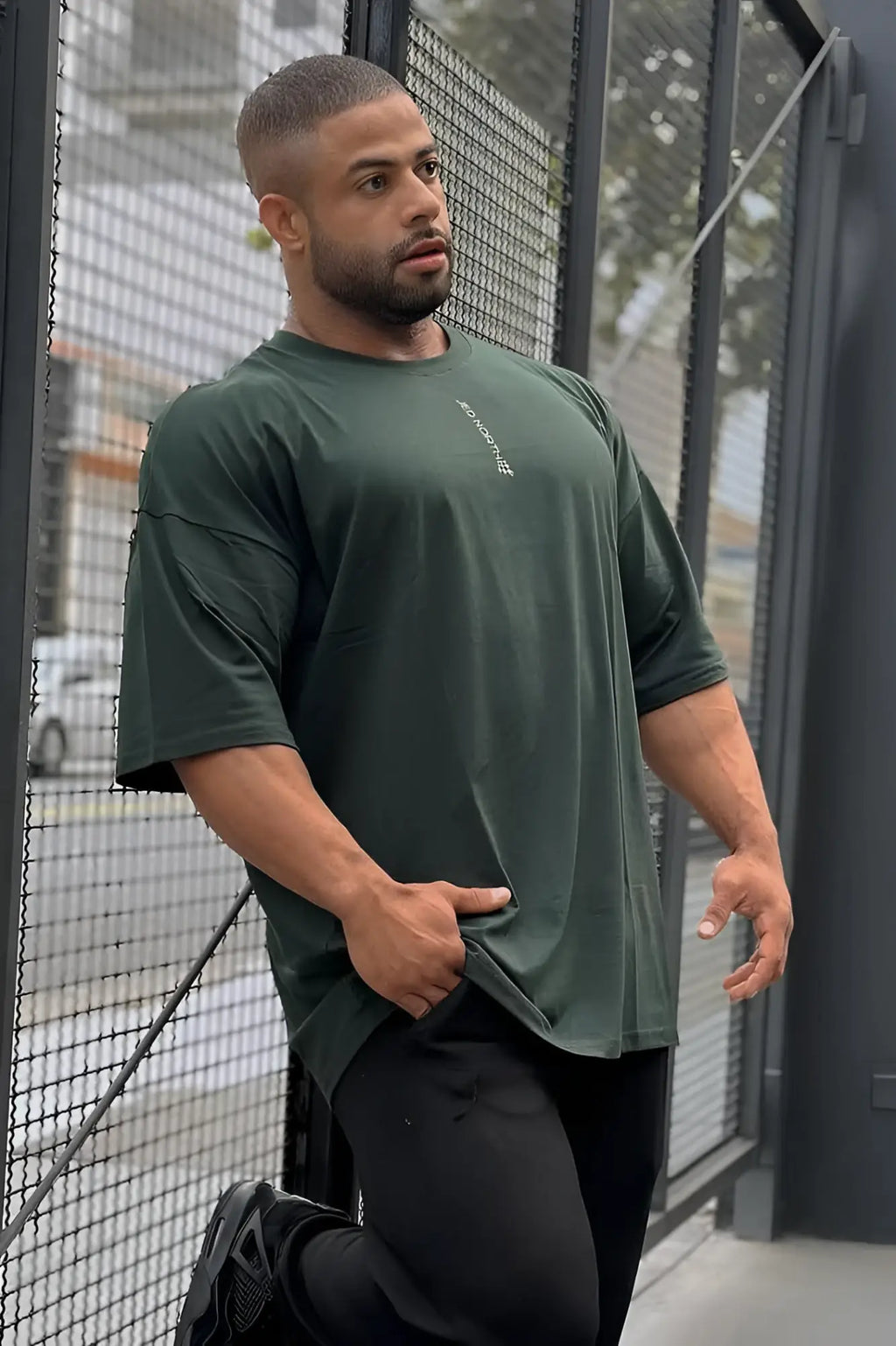 Jed North Energy oversized t-shirt in forest green with a small white logo on the left chest in dark green cotton