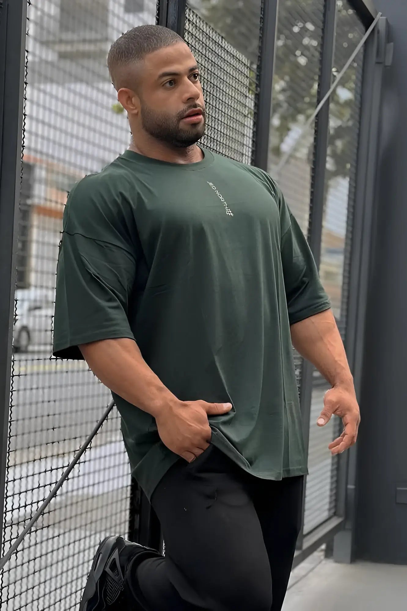 Jed North Energy oversized t-shirt in forest green with a small white logo on the left chest in dark green cotton