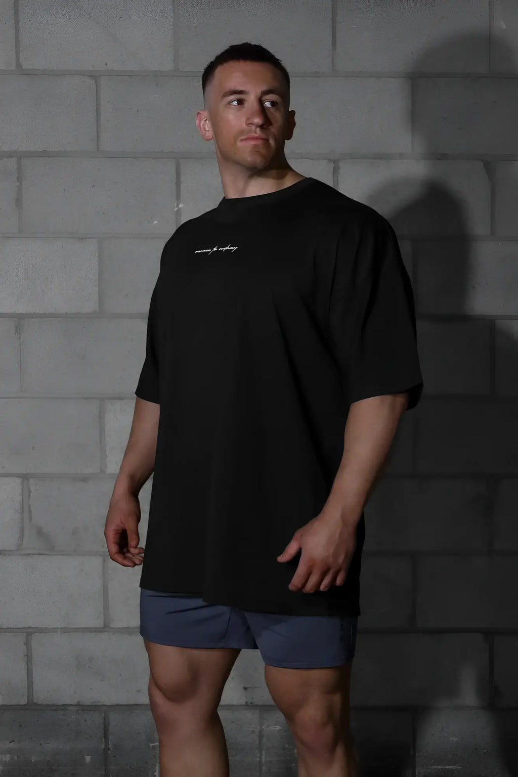 Jed North Energy oversized black t-shirt for men with small white embroidered logo on chest in cotton blend material