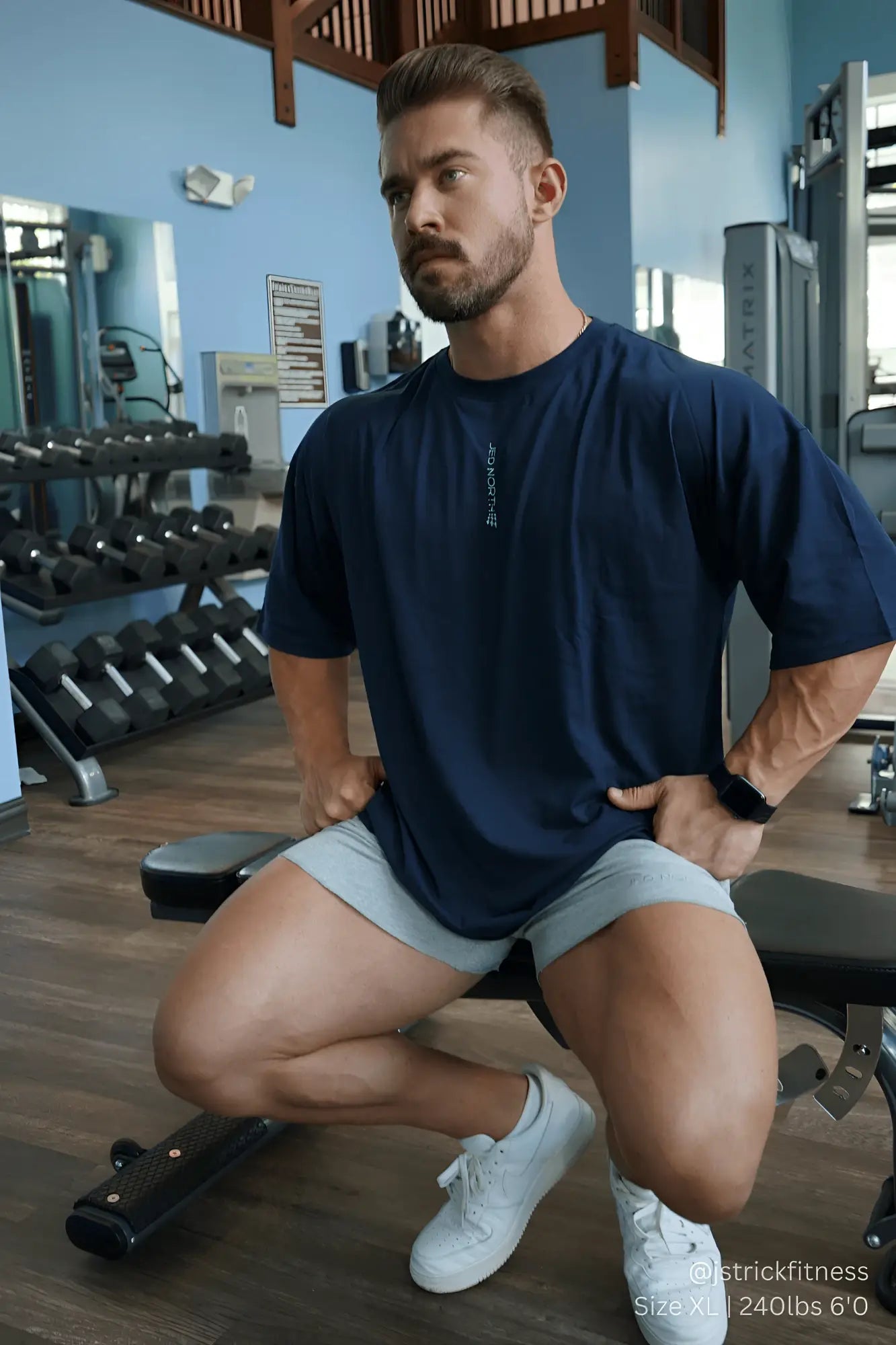 Navy blue Jed North Energy oversized t-shirt with short sleeves and subtle vertical logo on left chest in midnight blue