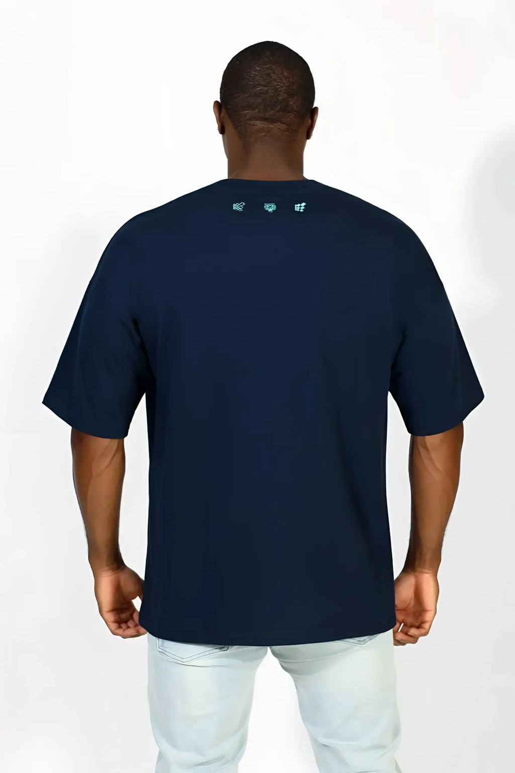 Navy blue jed north energy oversized t-shirt with subtle light teal logo details at the neckline for casual wear