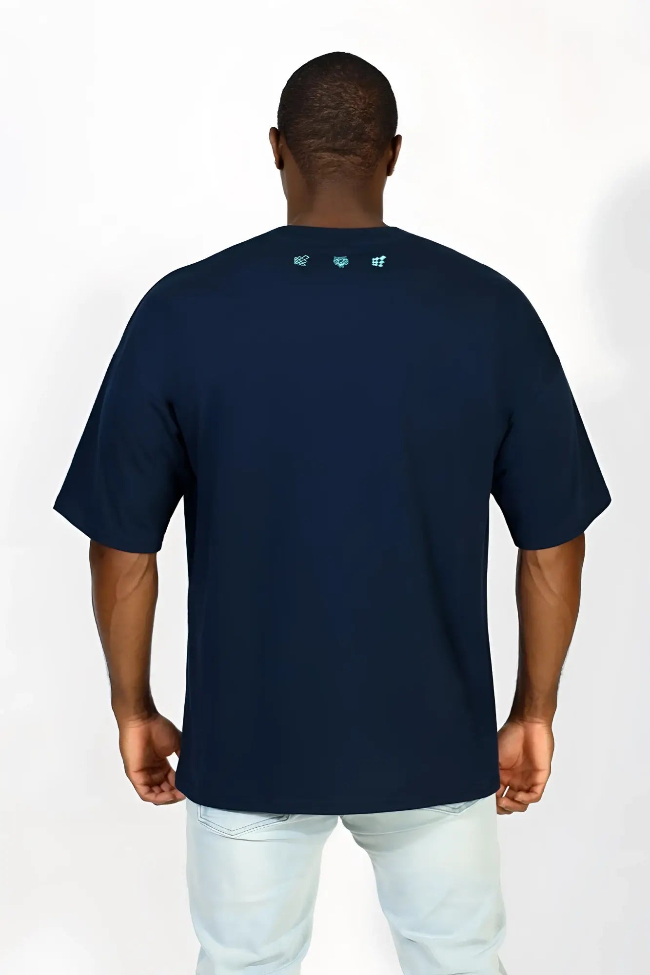 Navy blue jed north energy oversized t-shirt with subtle light teal logo details at the neckline for casual wear