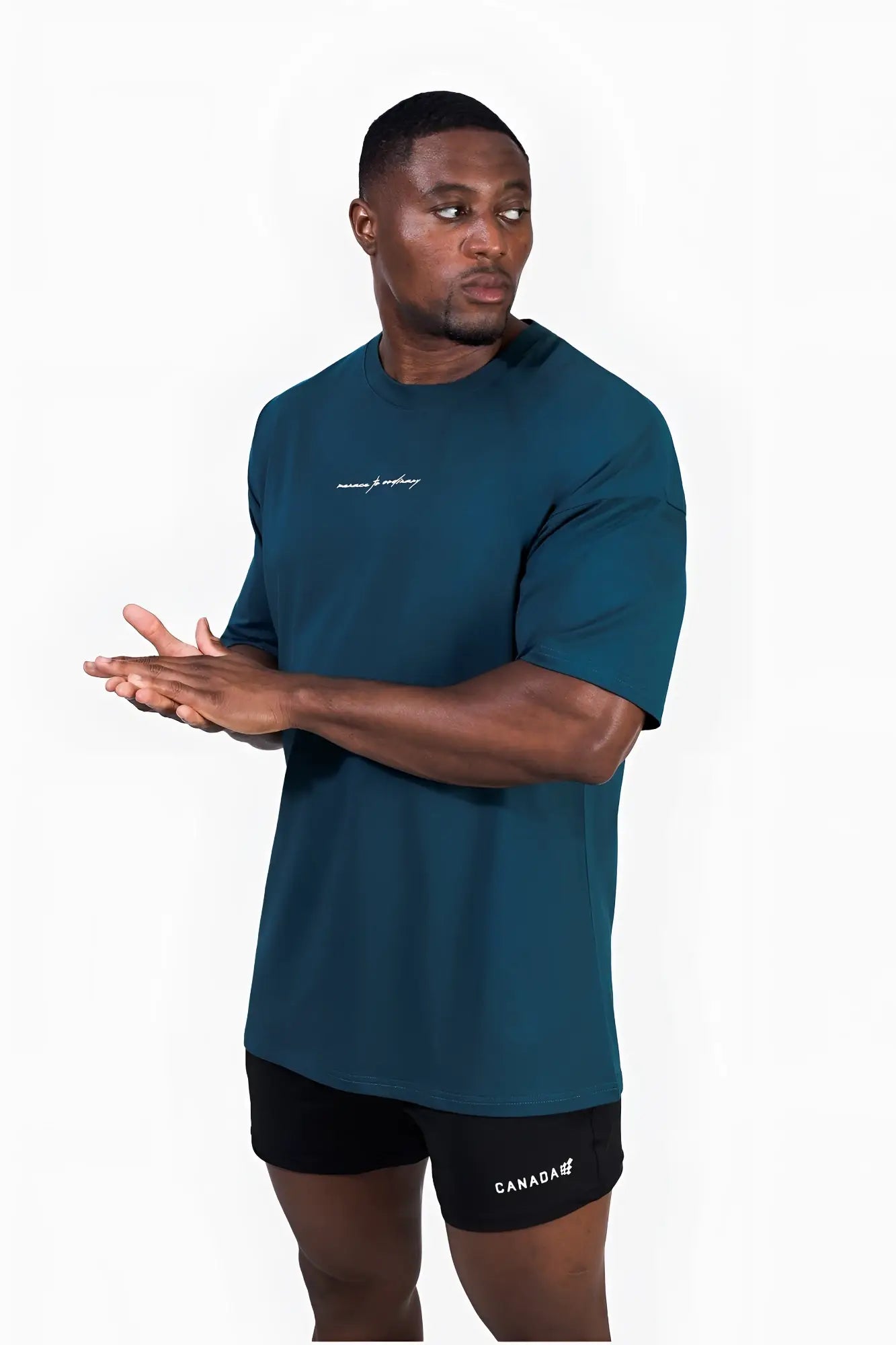 Energy oversized t-shirt in teal with short sleeves crew neck and small embroidered logo on the left chest