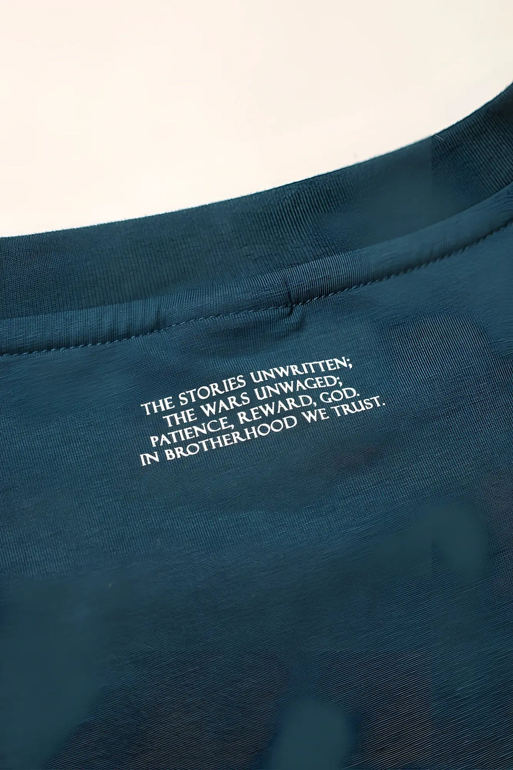 Dark teal oversized cotton t-shirt with white embroidered text at the neckline energy oversized t-shirt teal