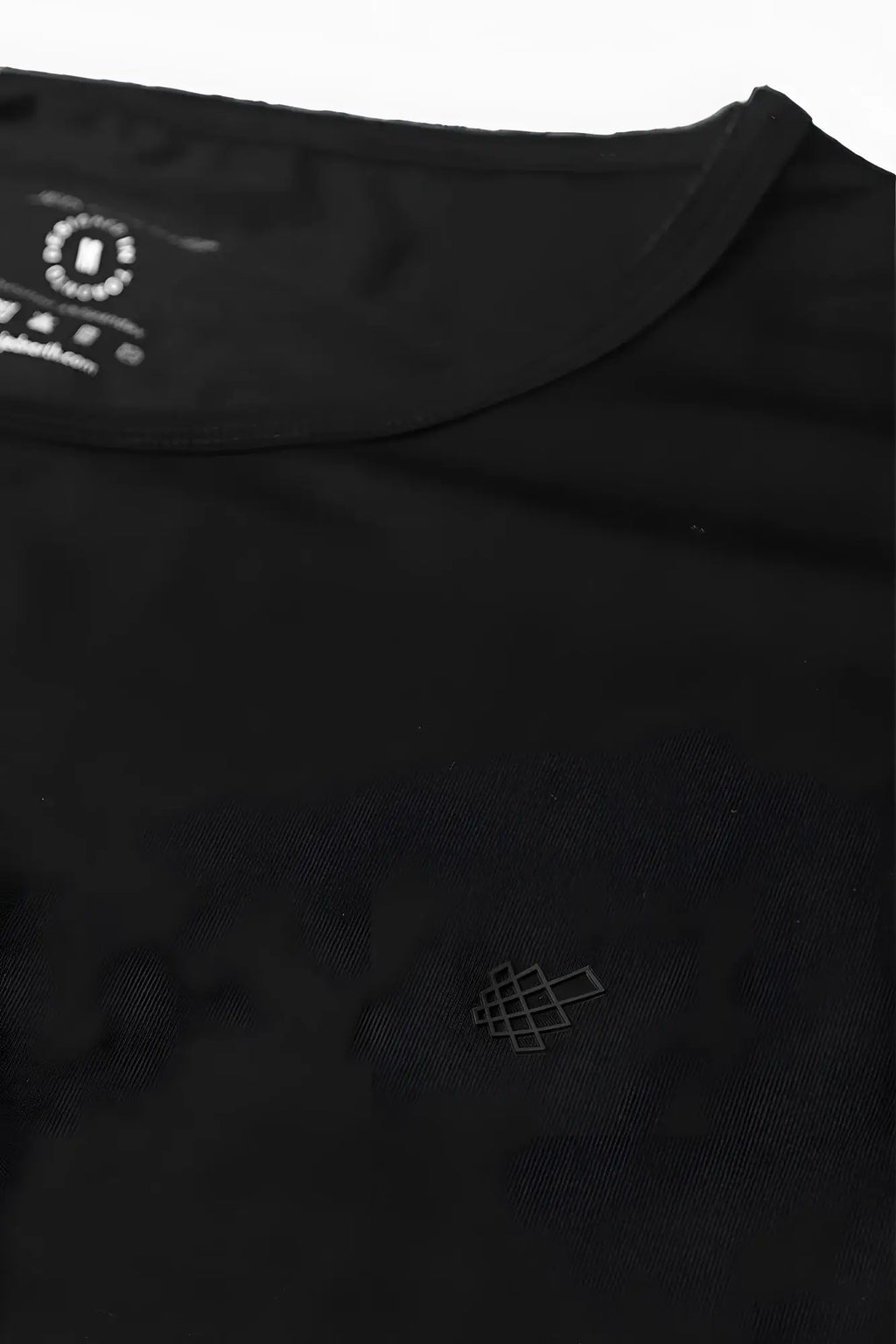 Black jed north evolve cap sleeve muscle t-shirt 2.0 with subtle geometric logo embroidery on chest and branded neckline tag