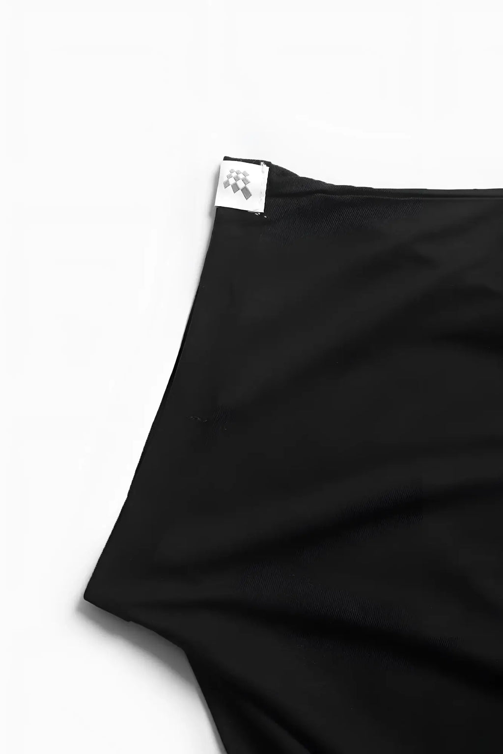 Black Jed North evolve cap sleeve muscle t-shirt 2.0 fabric with small white label and checkered logo at hem