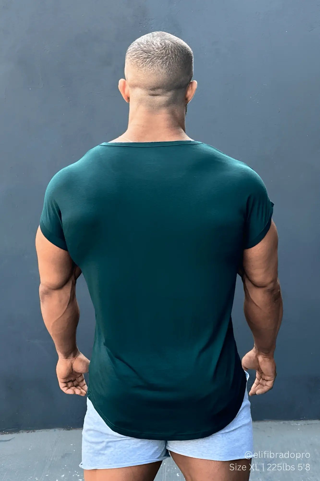 Jed North Evolve men’s cap sleeve forest green t-shirt in dark green with rounded neckline and form-fitting design