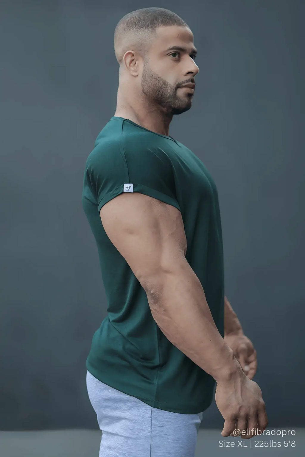 Jed north evolve men’s cap sleeve t-shirt 2.0 in forest green with short sleeves and a small white logo on the left sleeve