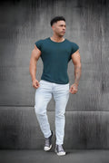 Dark green sleeveless athletic tee with crew neckline and fitted cut from jed north evolve men’s collection