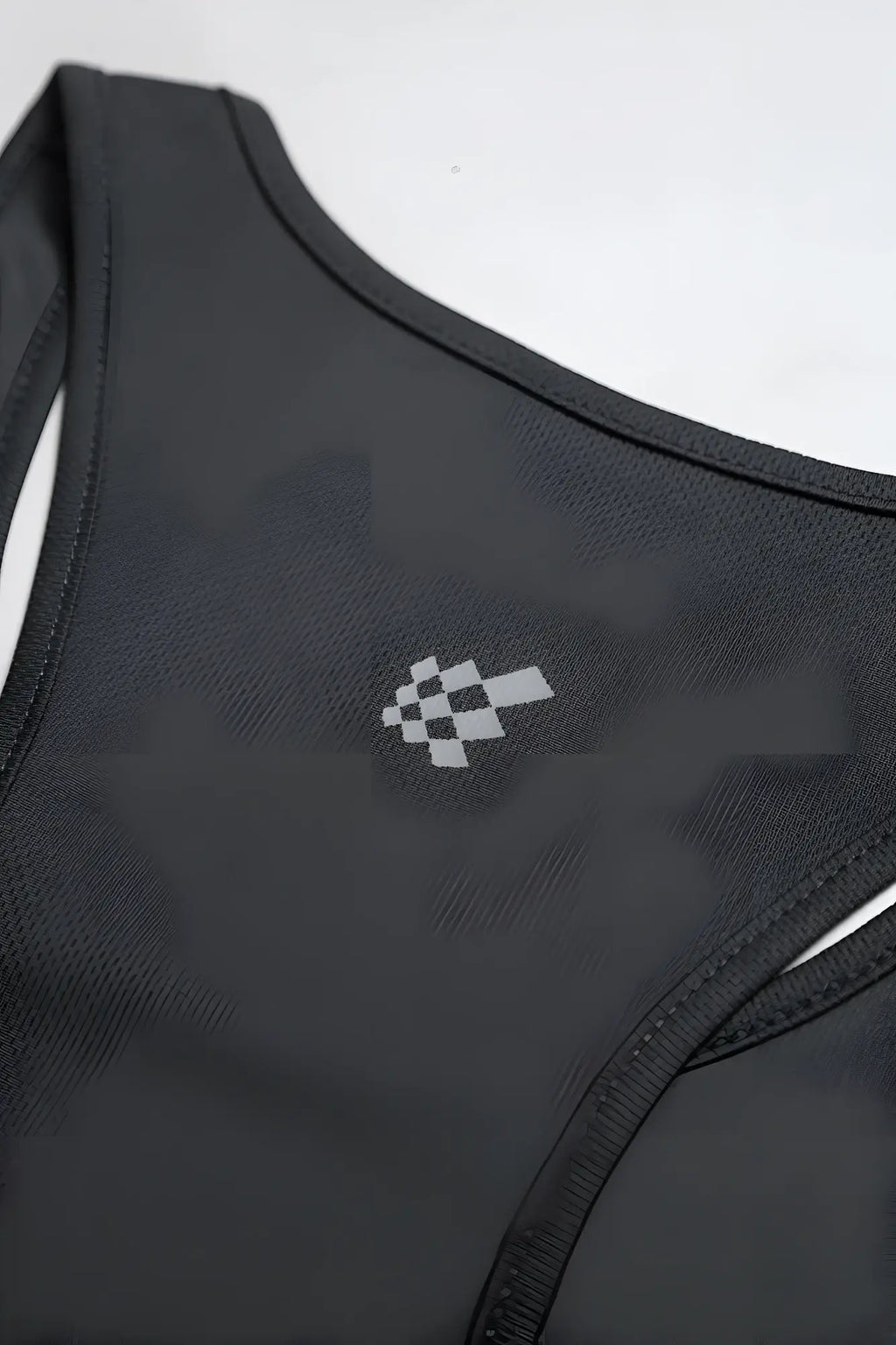 Black racerback fast-dry bodybuilding workout stringer sports bra with subtle gray checkered flag logo on chest