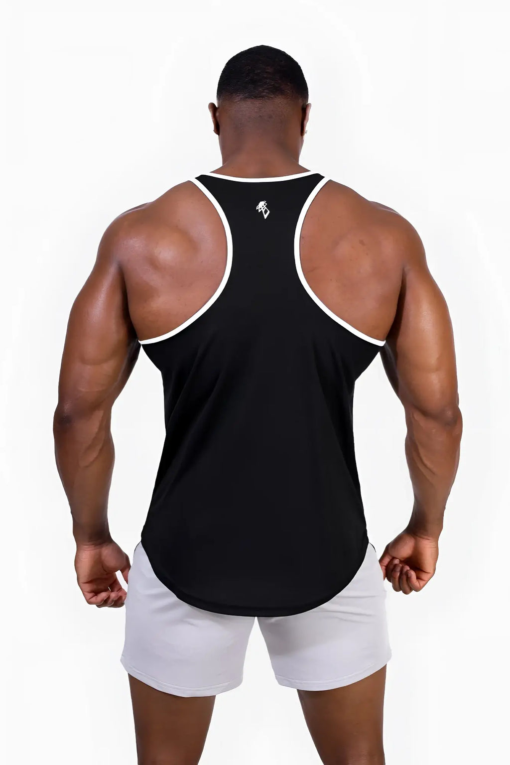 Back view of a black fast-dry bodybuilding workout stringer tank top with white trim and a small logo on the upper back