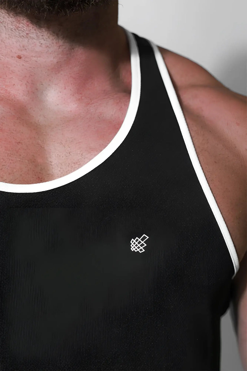 Black jed north fast-dry bodybuilding workout stringer tank top with white trim and geometric logo on the chest