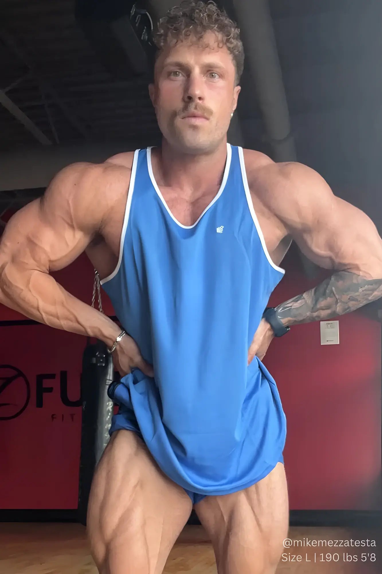 Jed north fast-dry bodybuilding workout stringer tank top in blue with white trim designed for athletic use