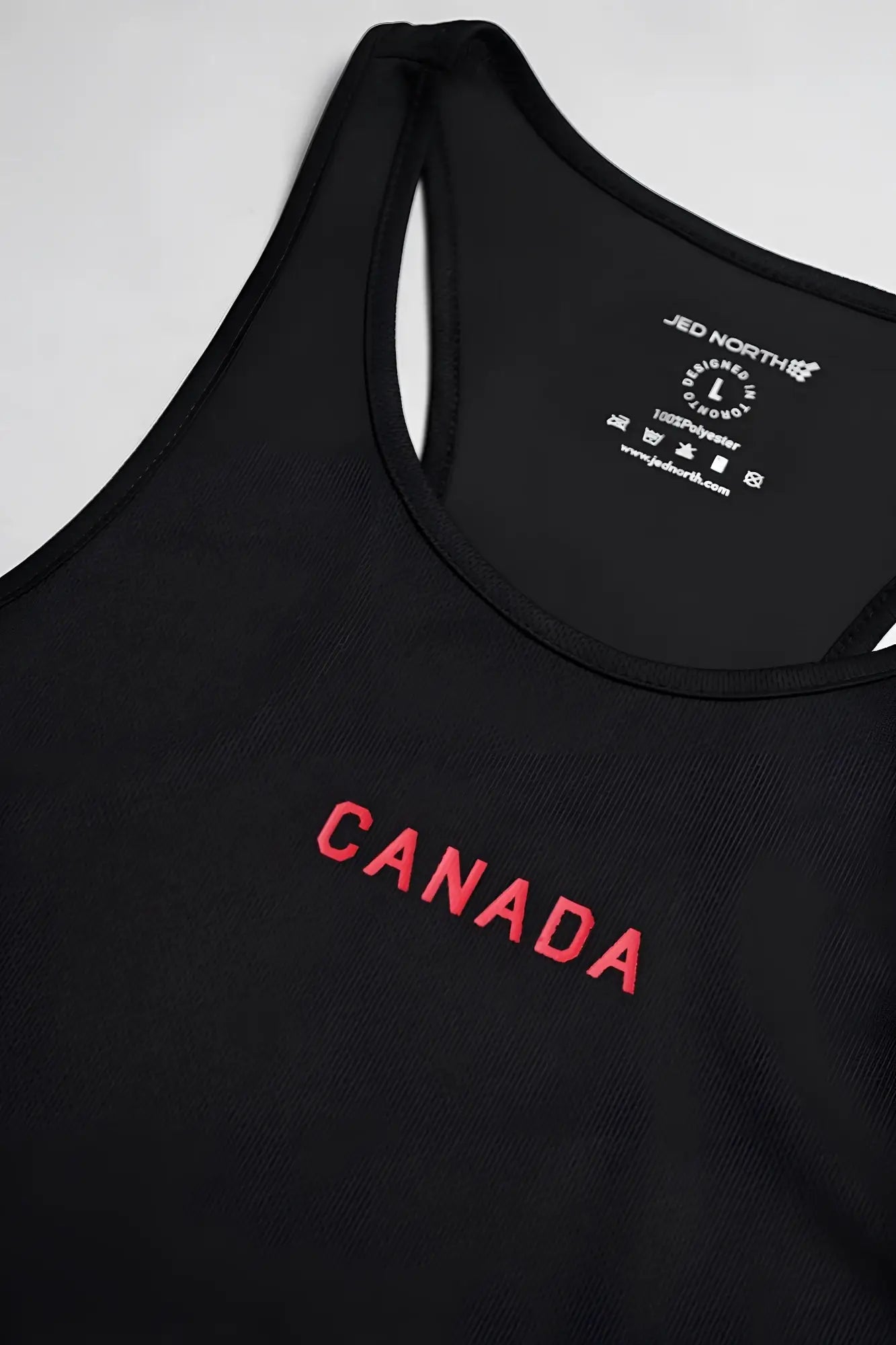 Black fast-dry bodybuilding stringer tank top with red canada embroidery for workout and training