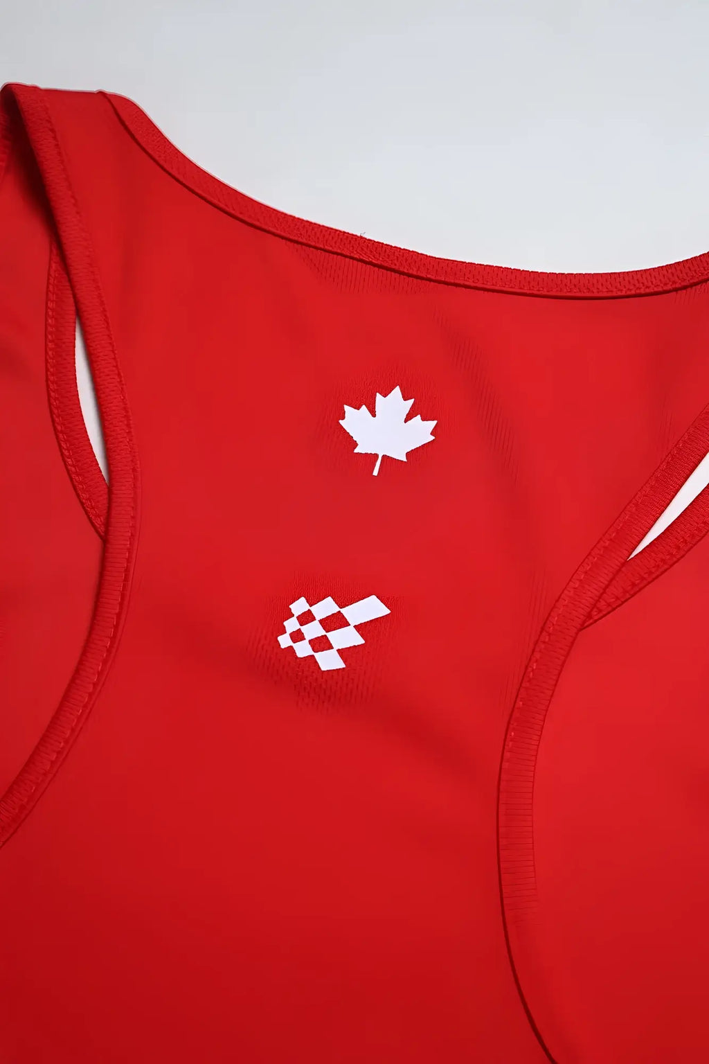 Red fast-dry bodybuilding workout stringer tank top with white maple leaf and checkered flag logo for intense training