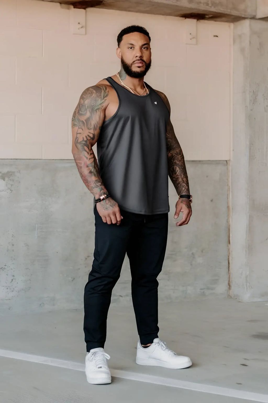 Jed North charcoal dark gray fast-dry sleeveless tank top with subtle logo for bodybuilding workouts
