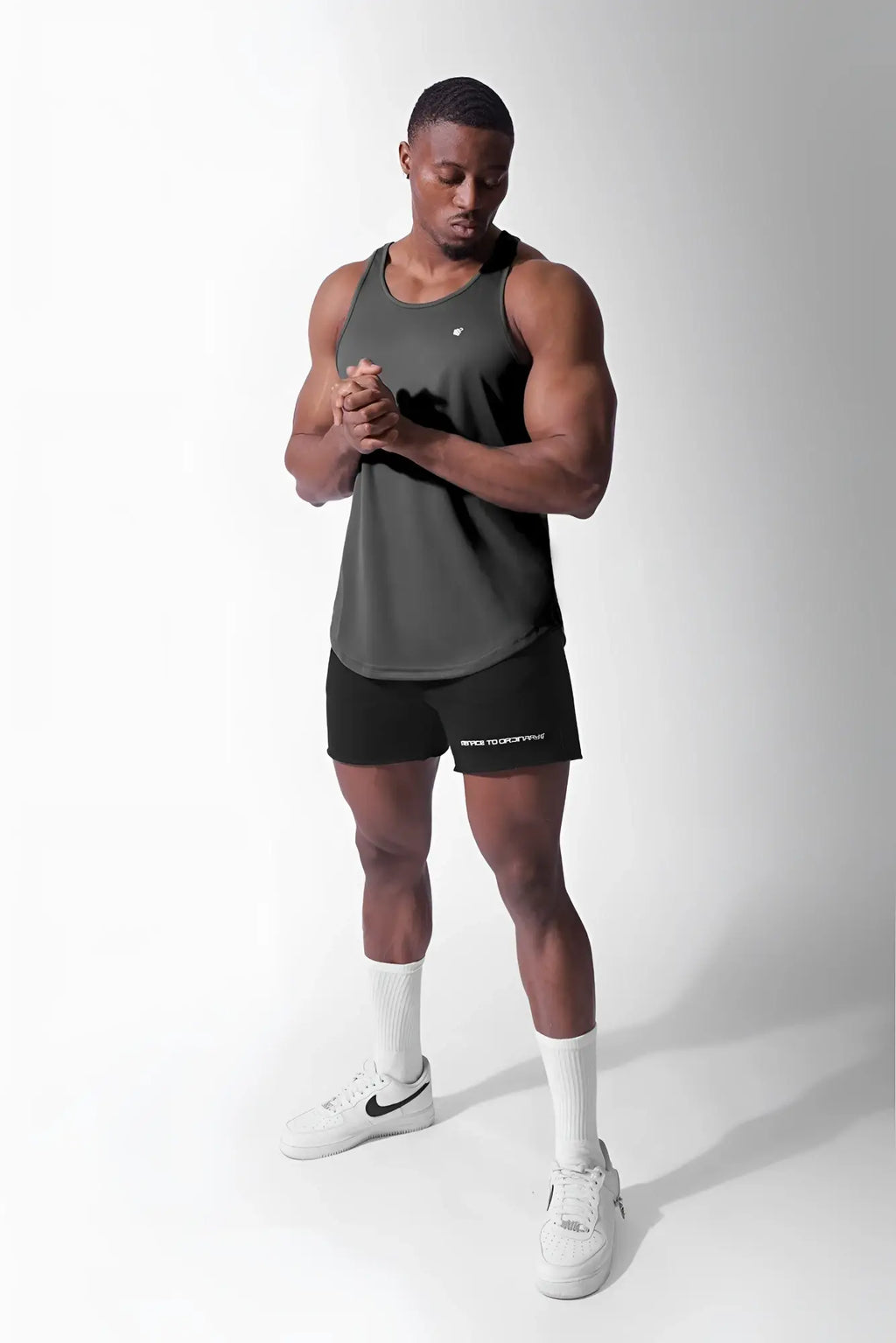 Jed North charcoal fast-dry sleeveless bodybuilding tank top with a small white logo on the upper left chest
