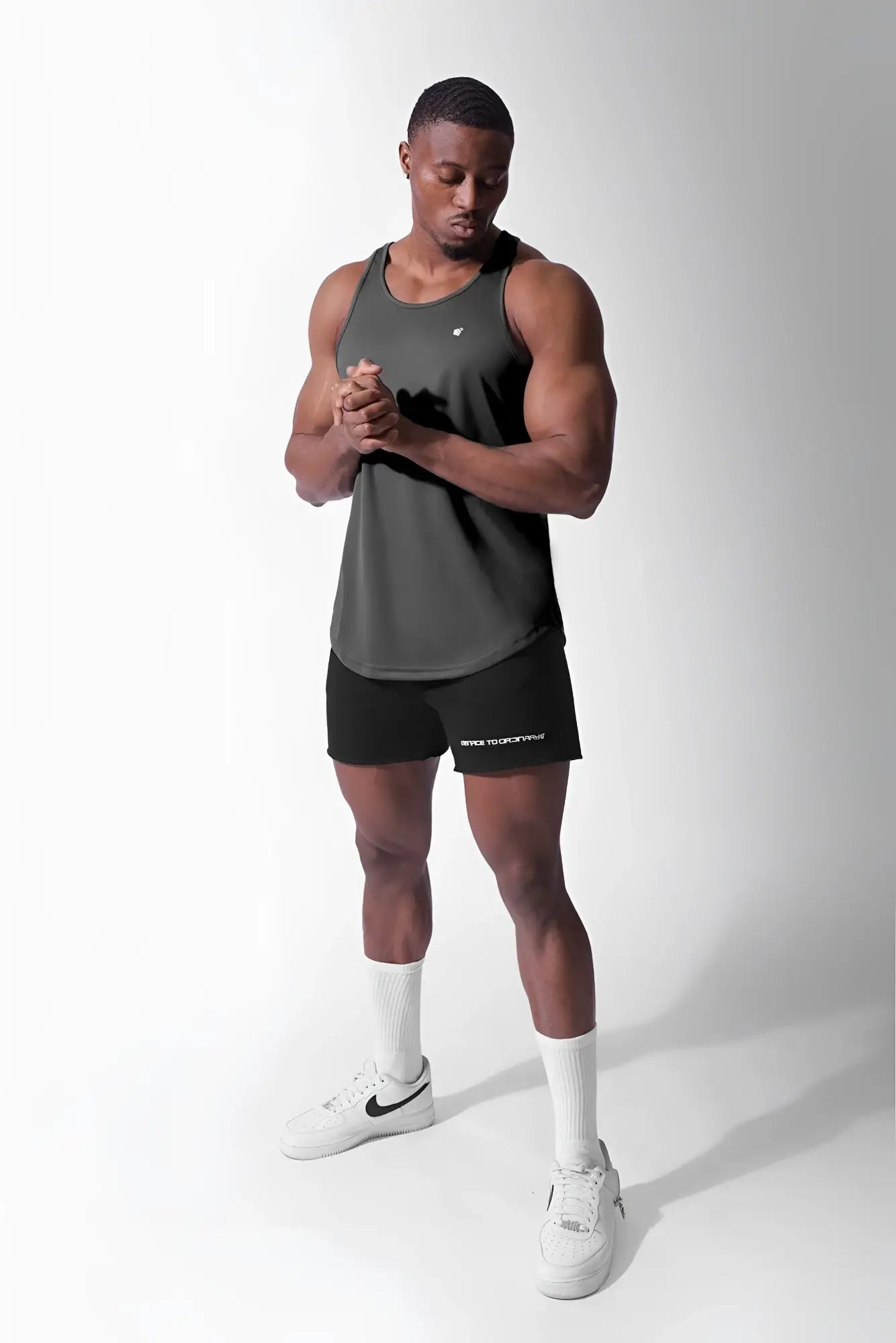Jed North charcoal fast-dry sleeveless bodybuilding tank top with a small white logo on the upper left chest