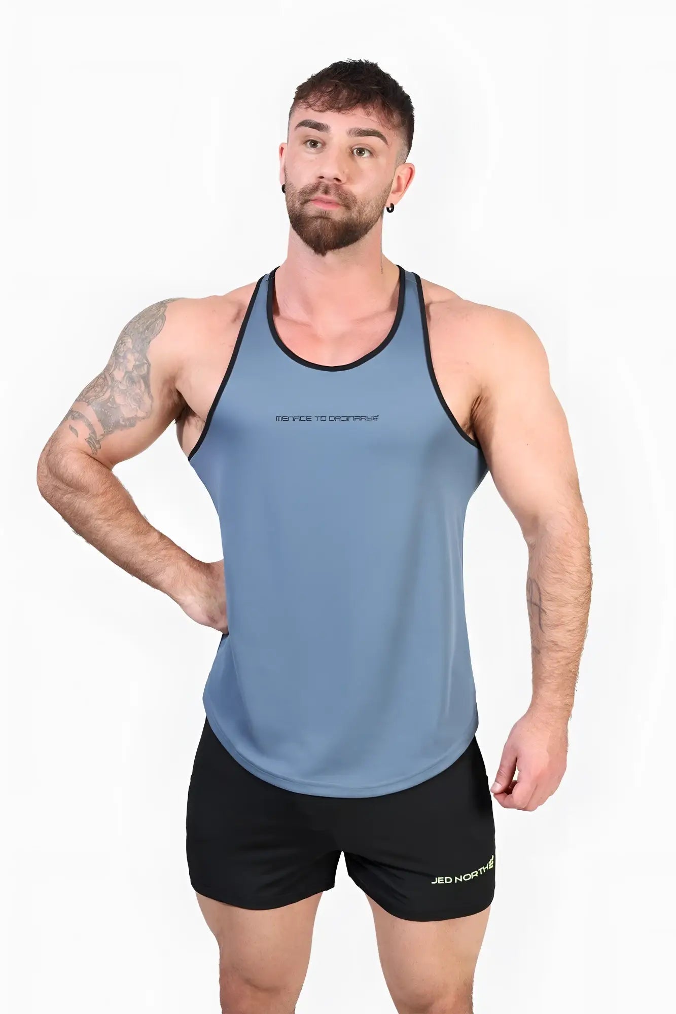 Blue athletic tank top with black trim and subtle rest to chop text on chest by jed north fast-dry workout stringer