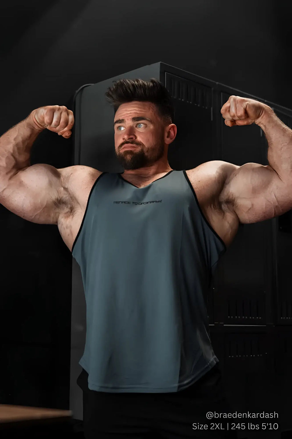 Jed North fast-dry sleeveless bodybuilding tank top in dark teal with black trim and subtle logo across the chest