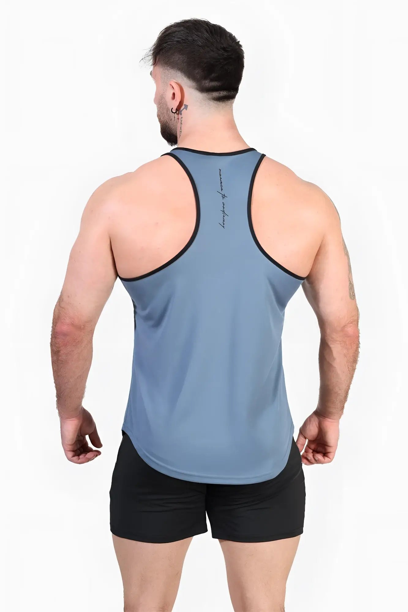 A light blue jed north fast-dry bodybuilding workout tank top with black trim on neckline and armholes