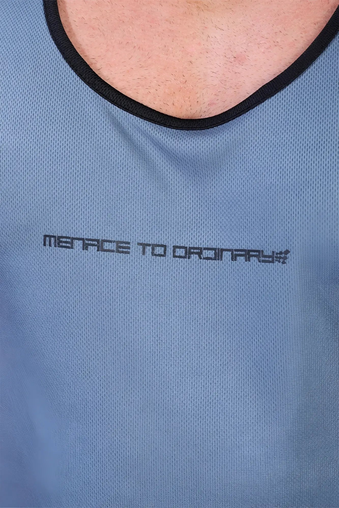 Jed North gray mesh fast-dry bodybuilding workout stringer with black trim and subtle menace to ordinary logo on chest