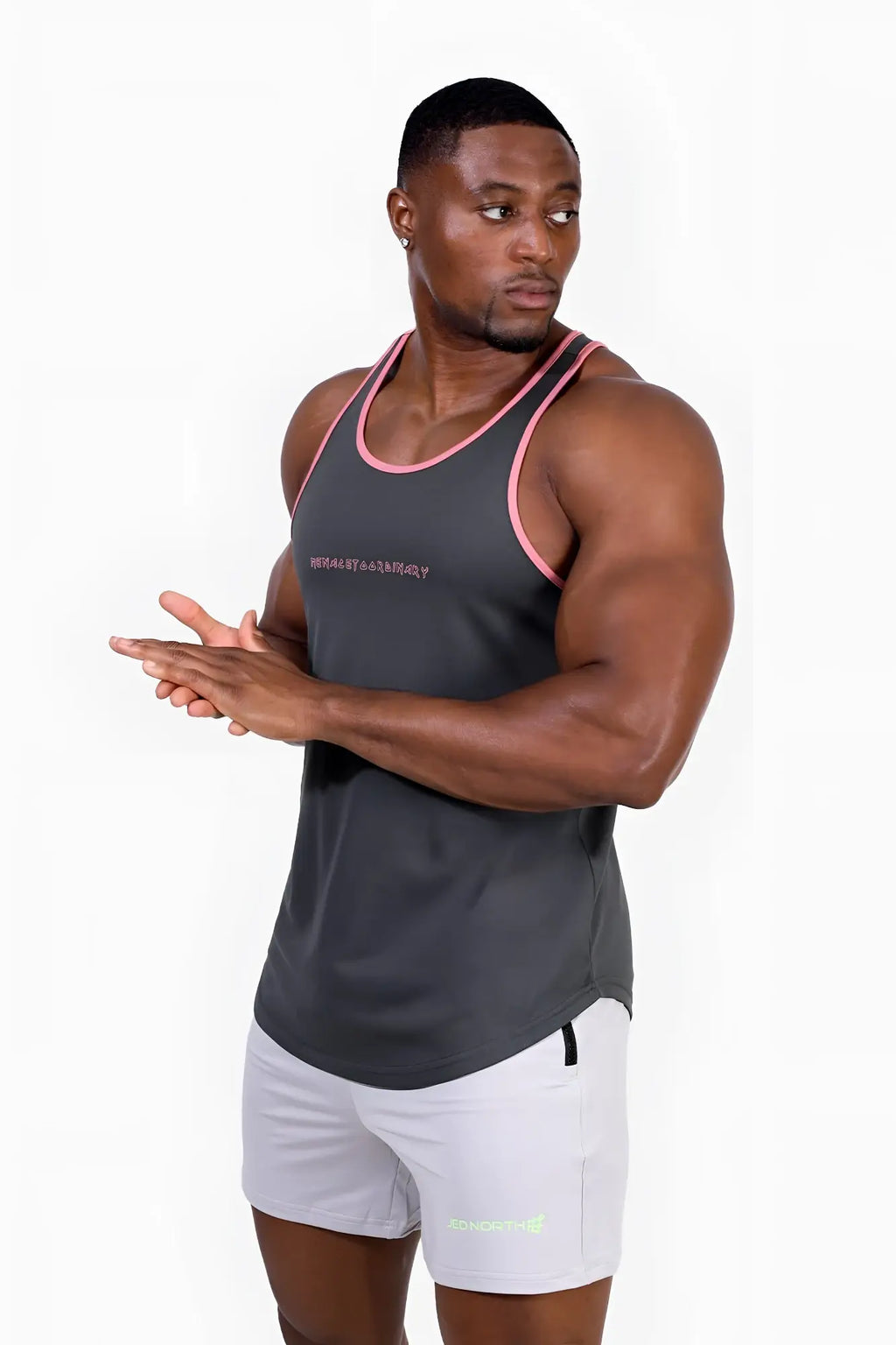 Dark gray fast-dry bodybuilding workout tank top with pink trim and subtle chest logo for athletic training
