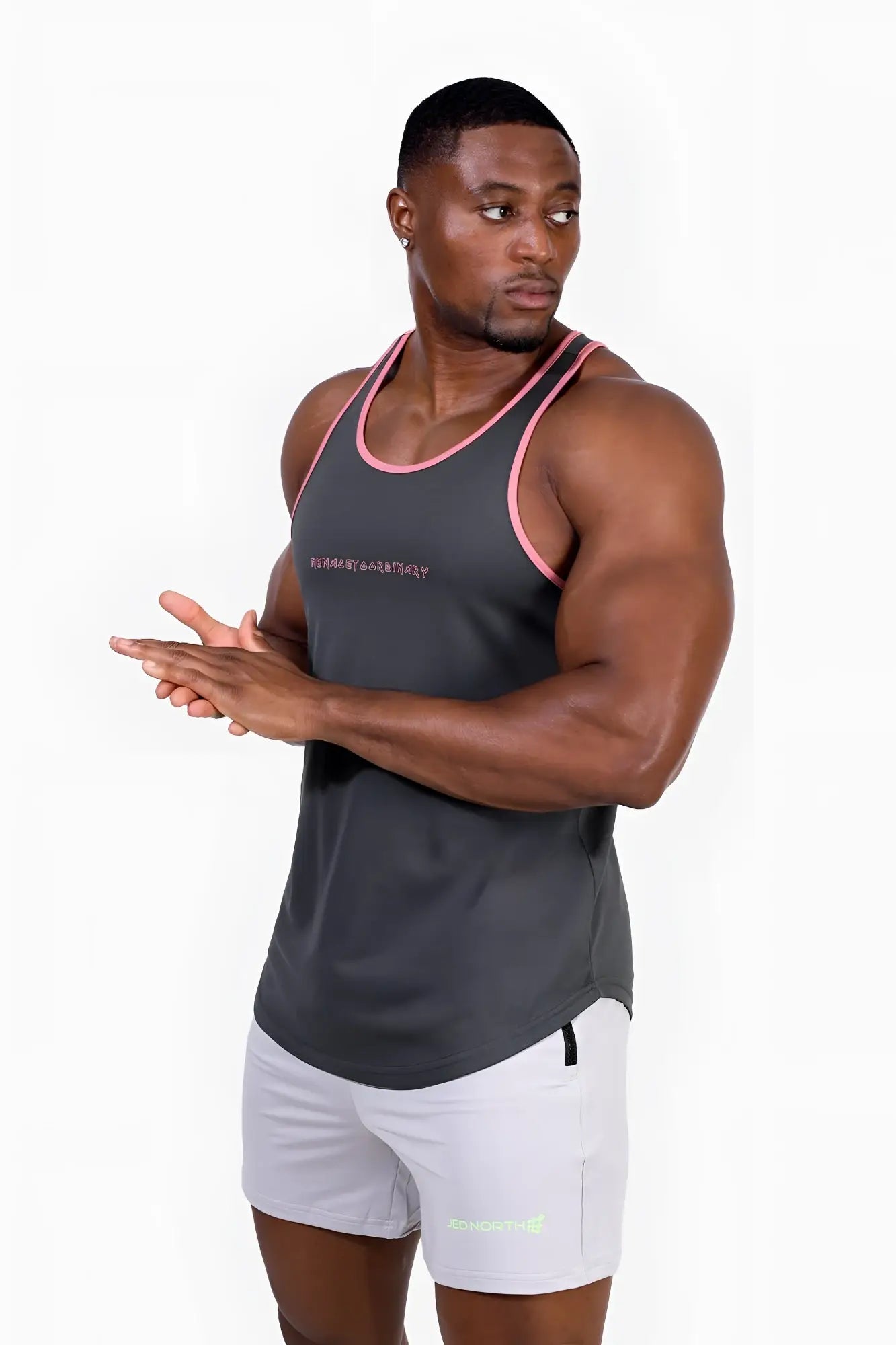 Dark gray fast-dry bodybuilding workout tank top with pink trim and subtle chest logo for athletic training