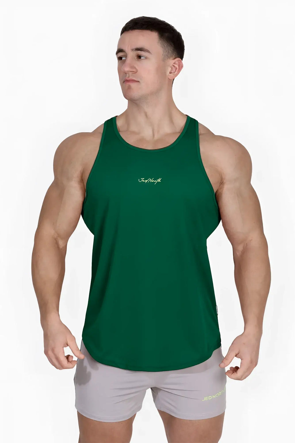 Dark green sleeveless fast-dry bodybuilding workout stringer tank top with subtle white logo on chest