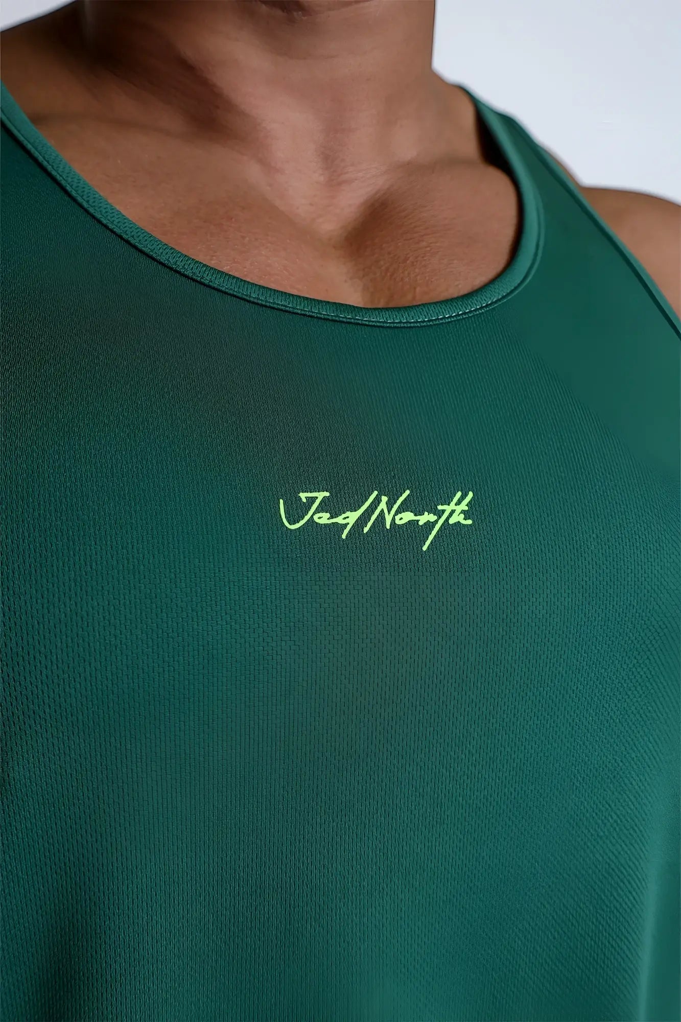 Dark green fast dry bodybuilding workout stringer tank top with neon green jad north logo embroidery on chest
