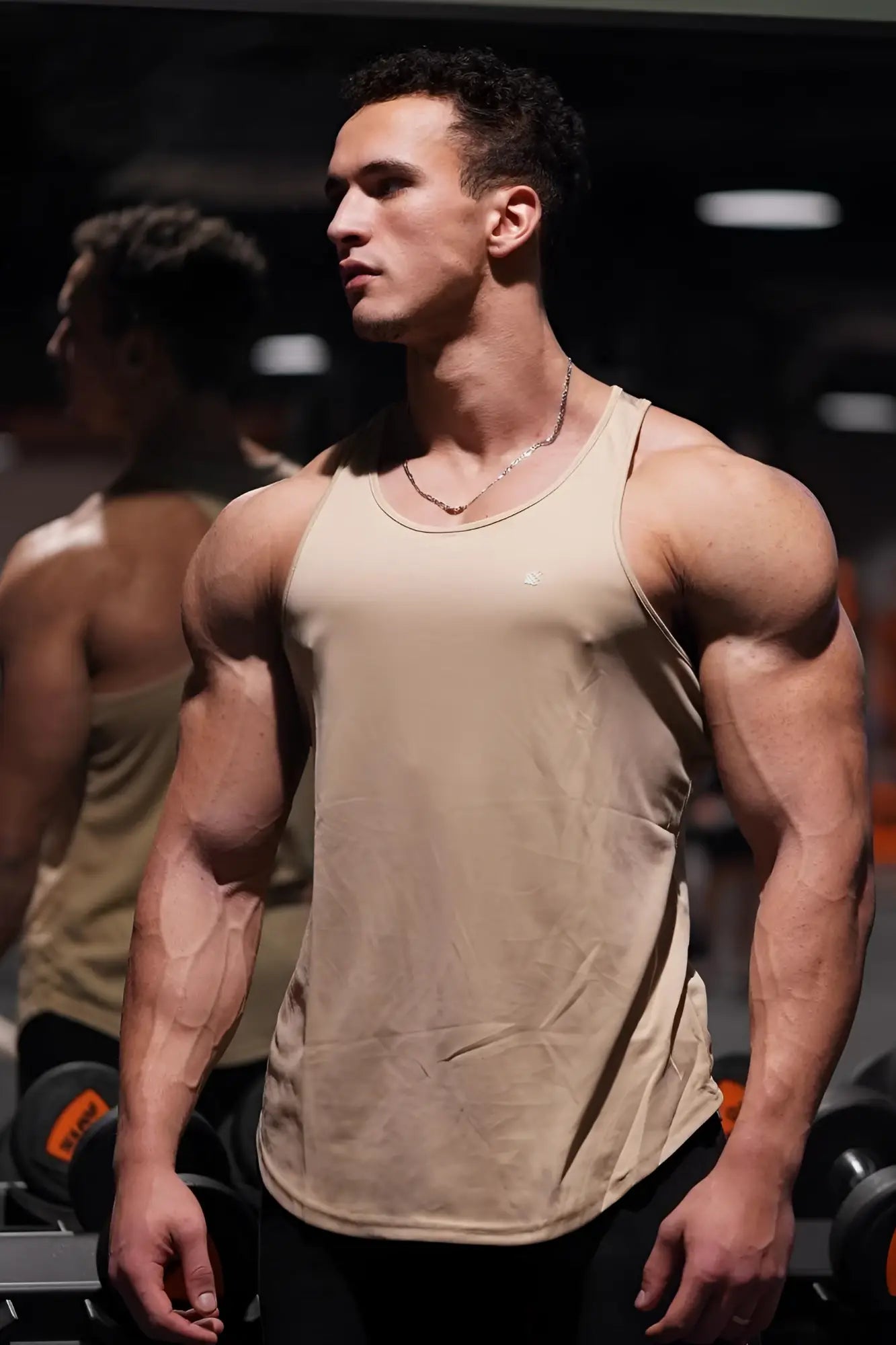 Beige jed north fast-dry bodybuilding workout stringer tank top with fitted design and subtle stitching details