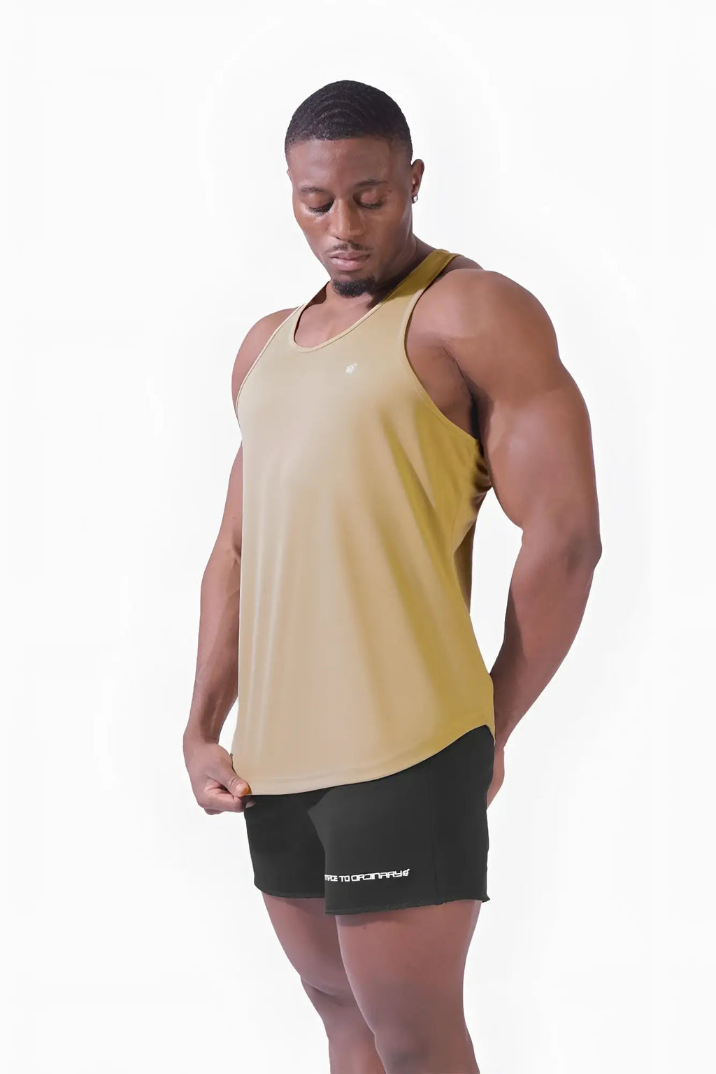 Jed North fast-dry bodybuilding workout stringer in mustard yellow with gradient effect and white chest logo