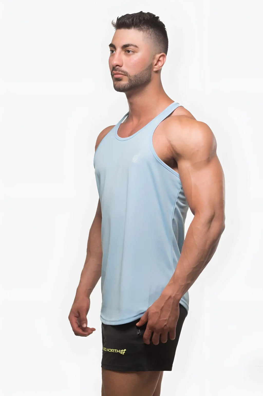 Light blue jed north sleeveless athletic tank top with smooth form-fitting fast-dry fabric for bodybuilding workouts