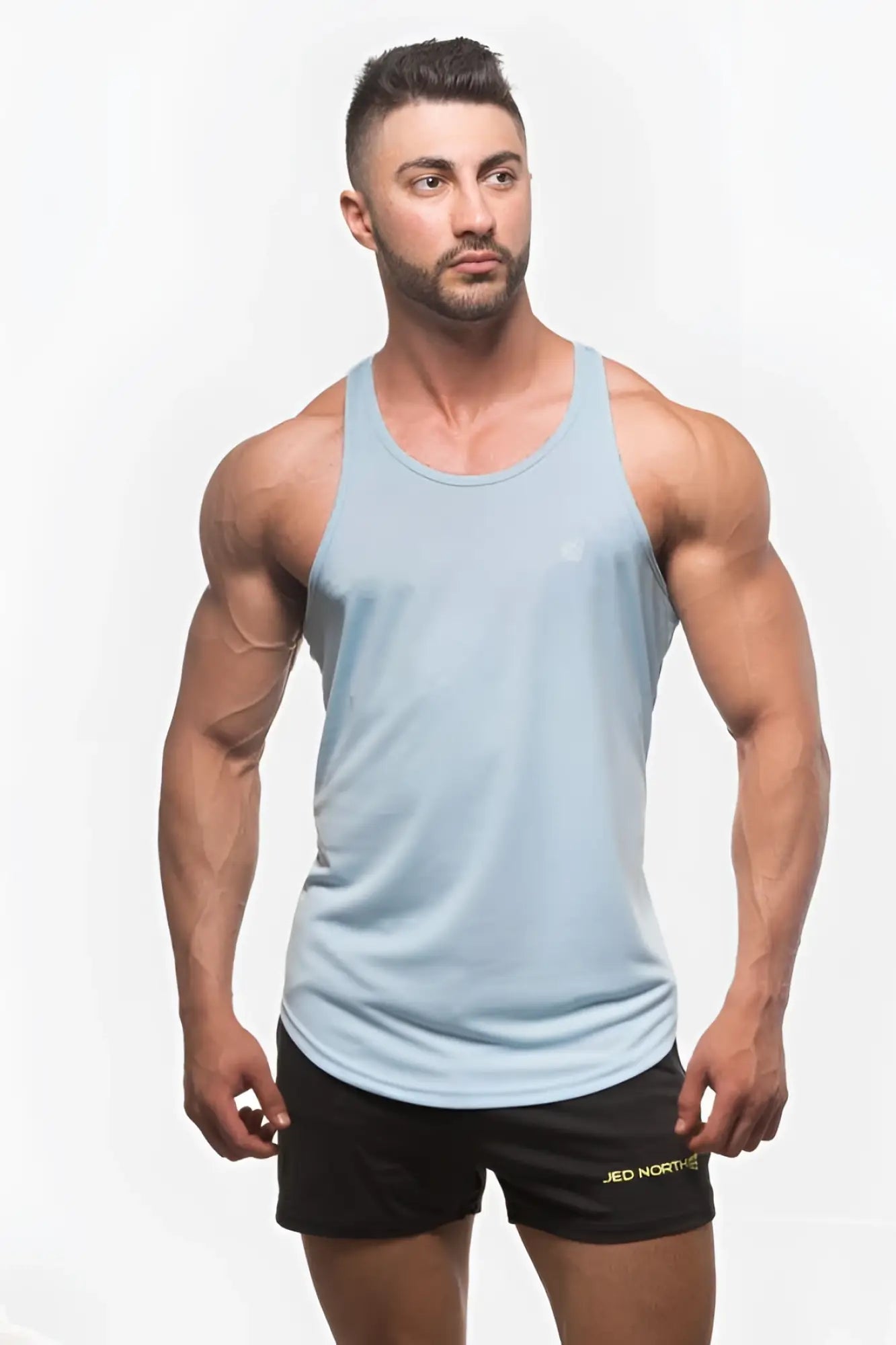 Light blue sleeveless jed north fast-dry bodybuilding workout stringer with subtle chest logo for athletic use
