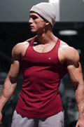 A maroon jed north fast-dry bodybuilding workout stringer tank top made of stretchy fabric with a small chest logo