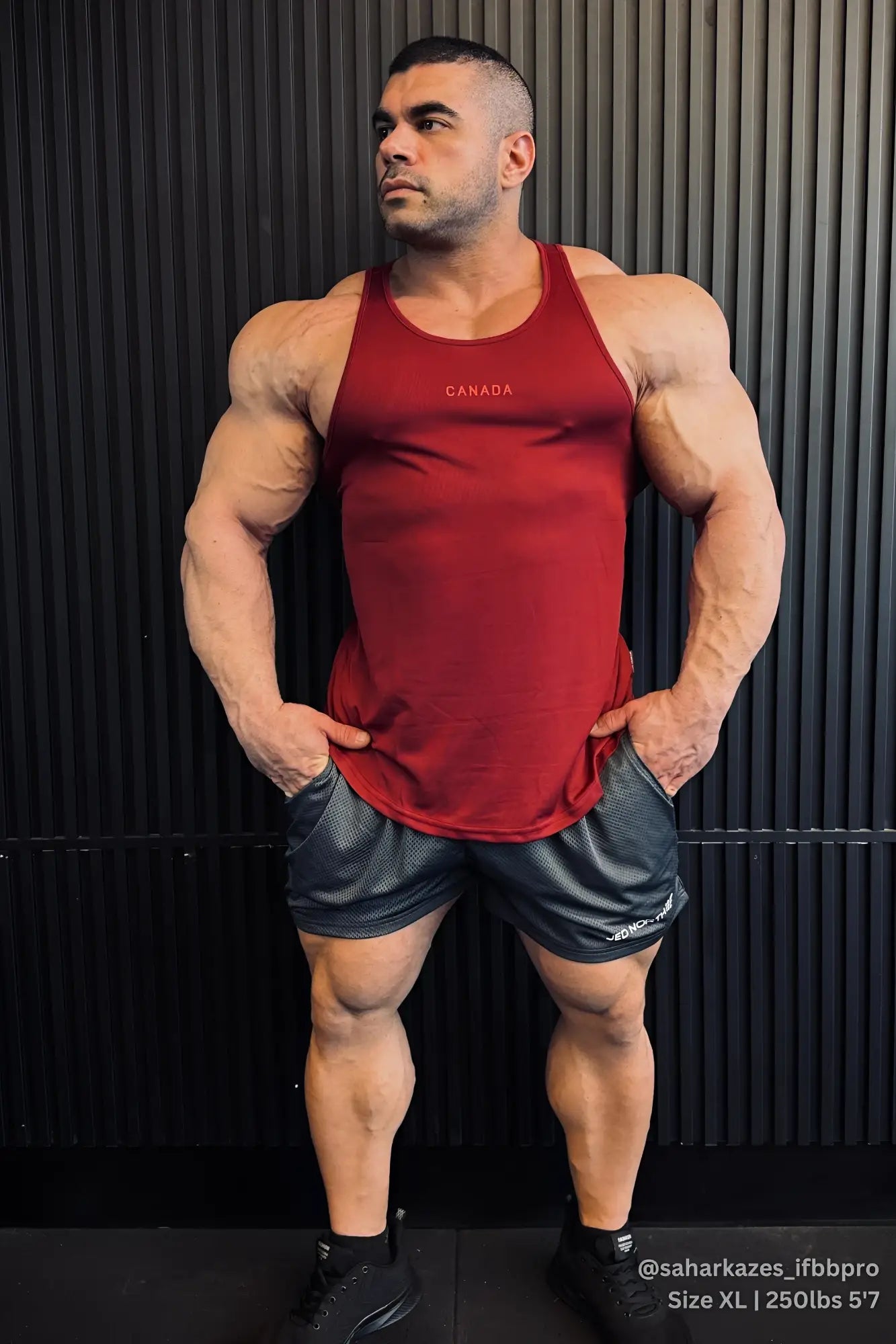 Fast dry bodybuilding workout stringer tank top in maroon with canada logo featuring a fitted athletic cut and ribbed texture