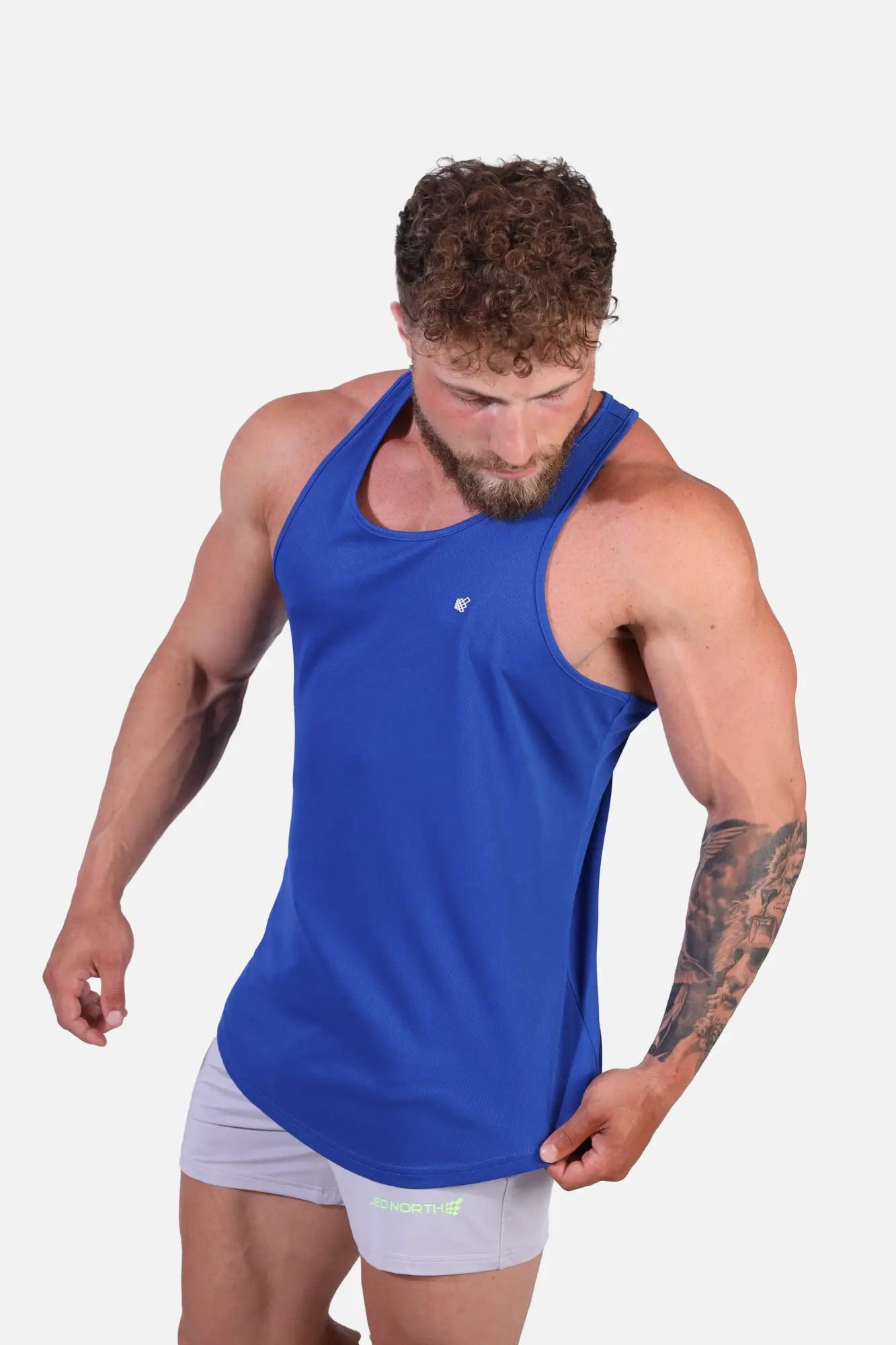 Blue fast-dry bodybuilding workout stringer tank top with small chest logo designed for athletic performance