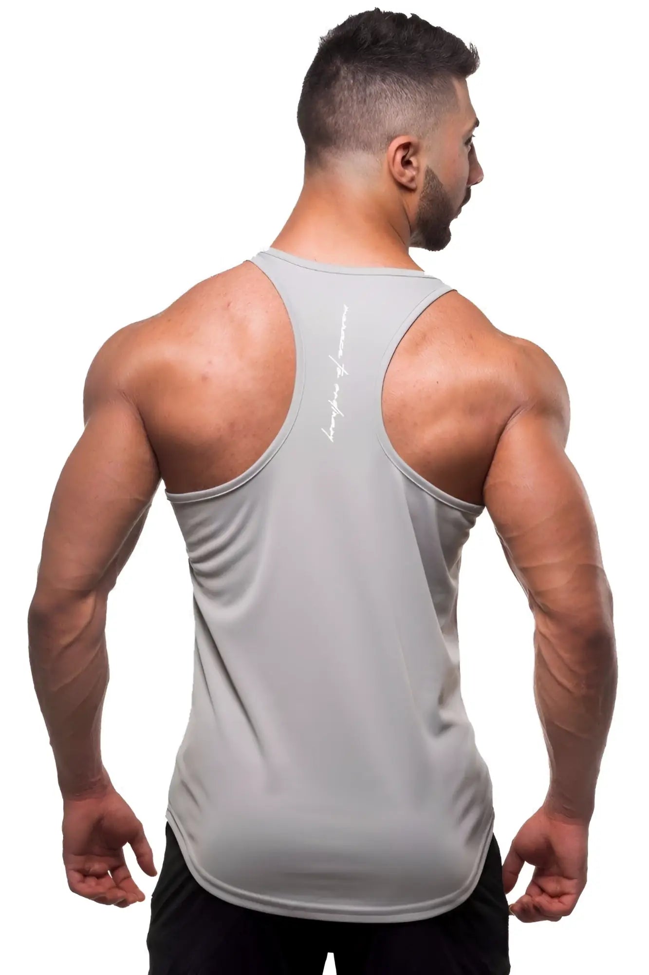 Back view of gray jed north fast-dry bodybuilding workout stringer tank top with subtle white vertical logo