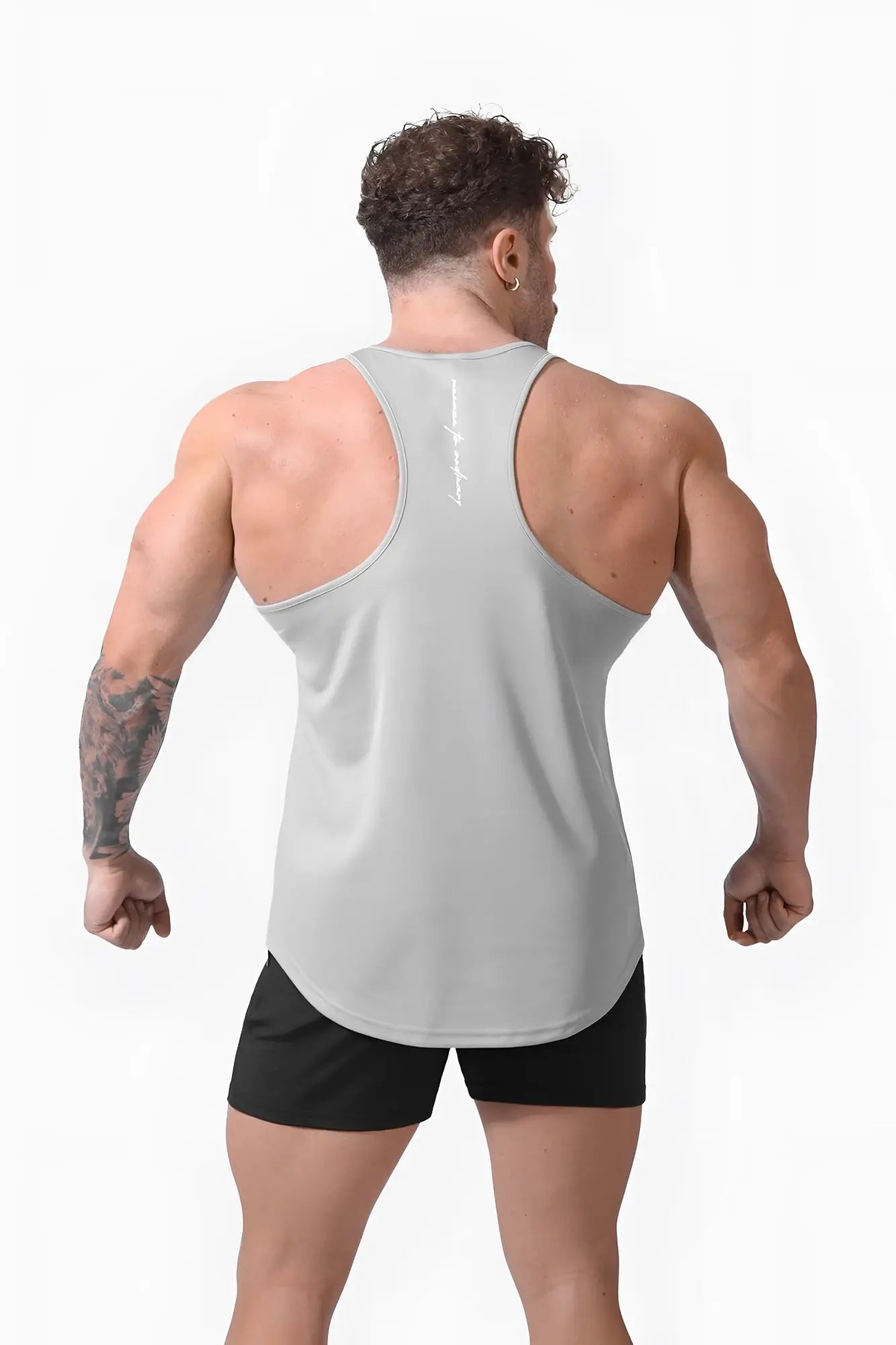 Light gray sleeveless jed north fast dry bodybuilding workout stringer with subtle white logo on the back