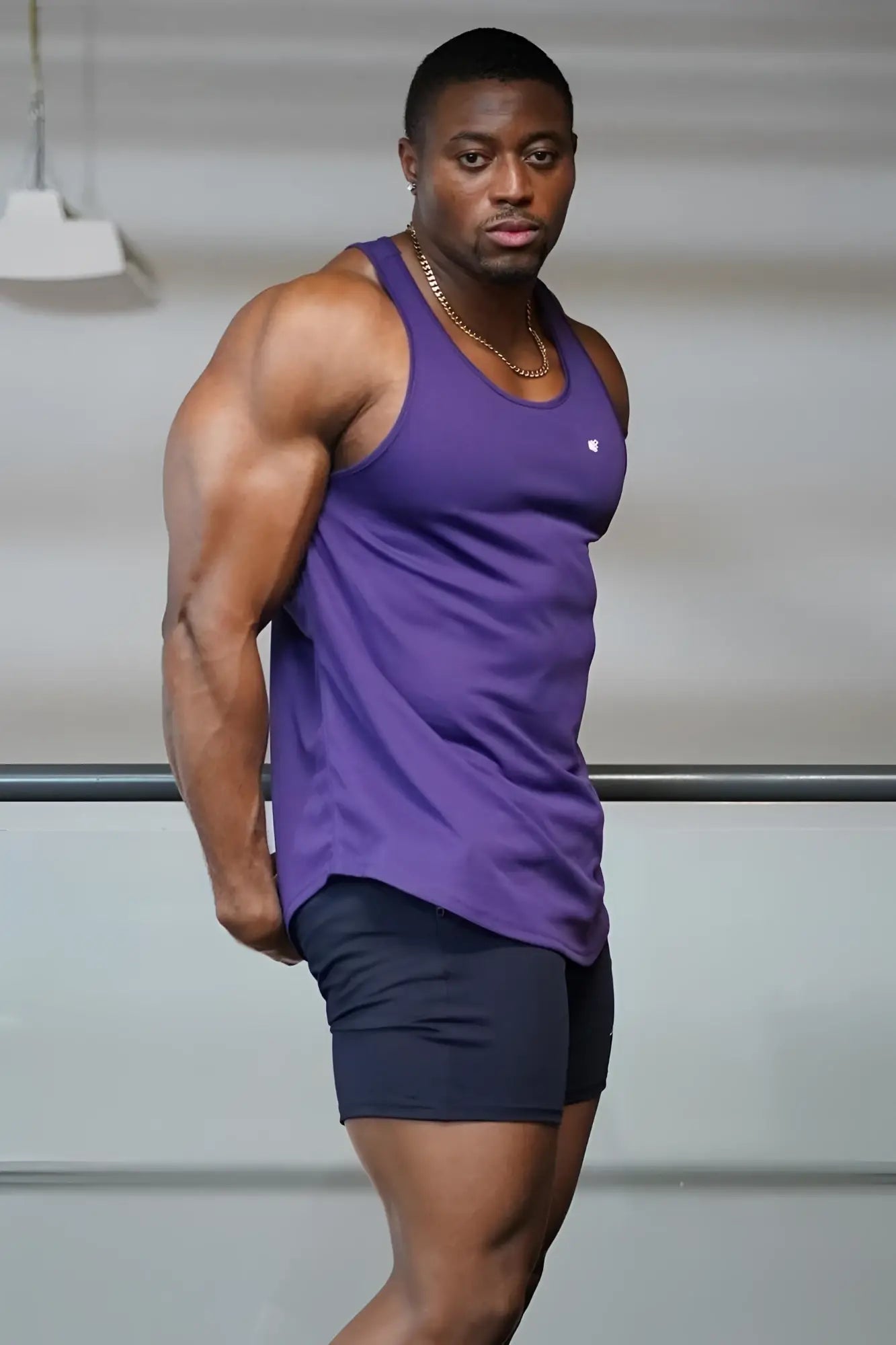 Purple jed north fast-dry bodybuilding workout stringer tank top with small white logo on the chest