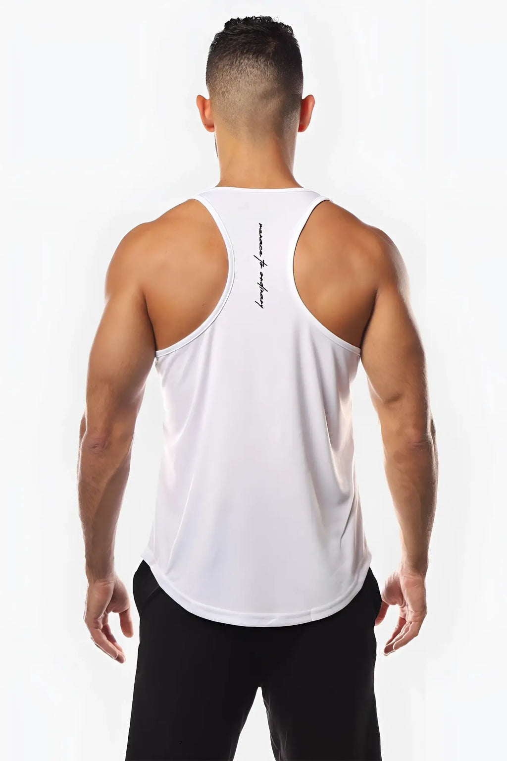 Back of jed north fast-dry white racerback tank top with black cursive text down the spine for bodybuilding workouts